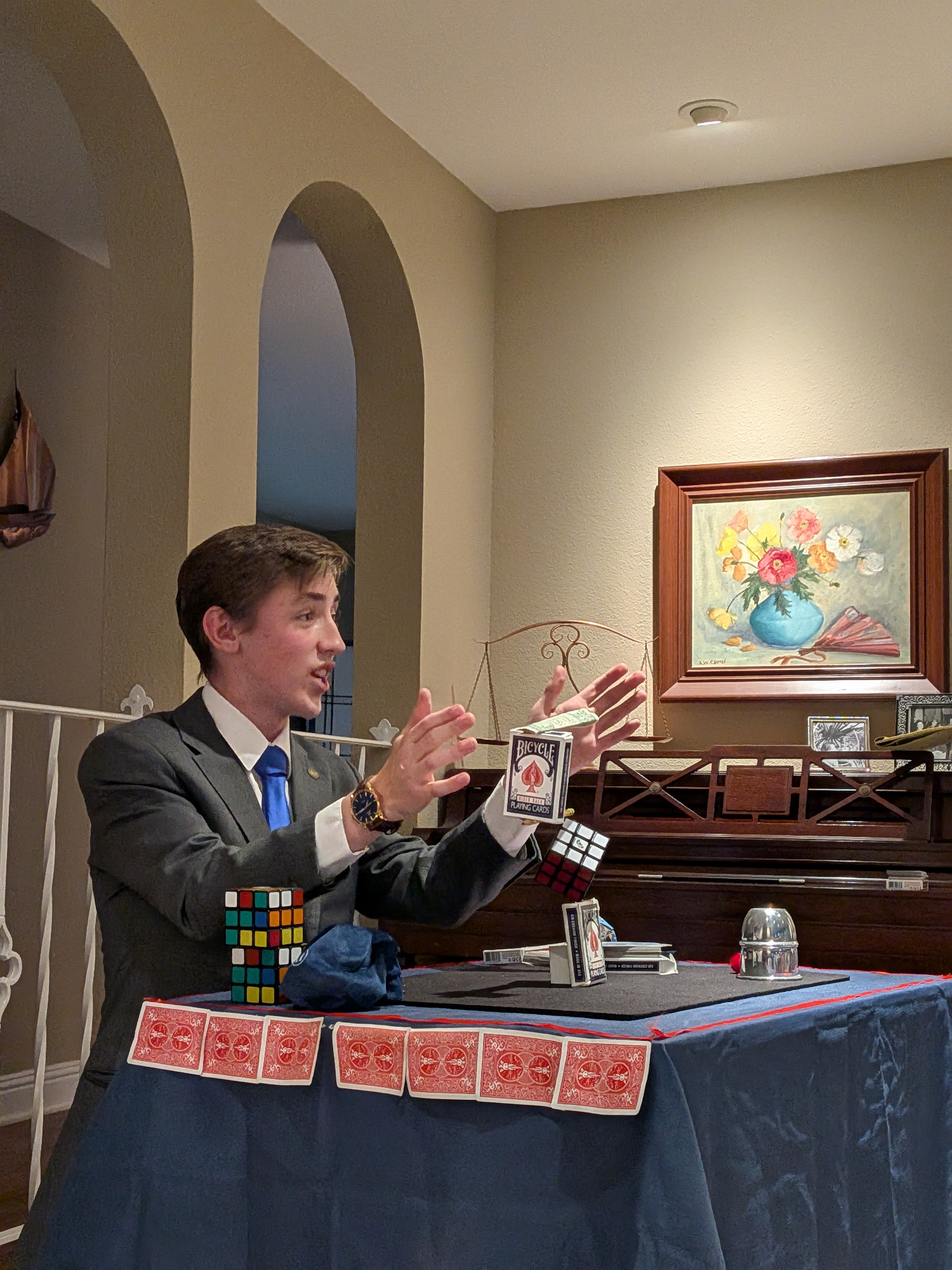 Josiah performing close-up card magic